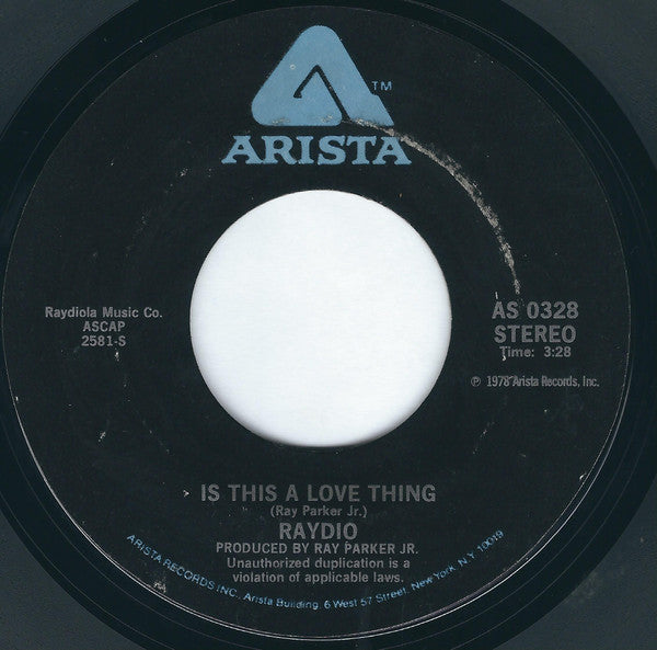 Raydio : Is This A Love Thing (7", Single, Styrene, PRC)