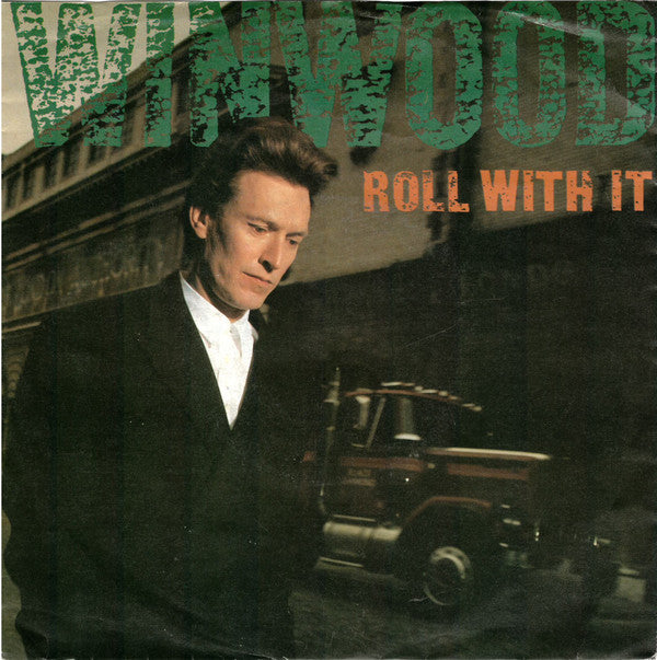 Steve Winwood : Roll With It (7", Single)