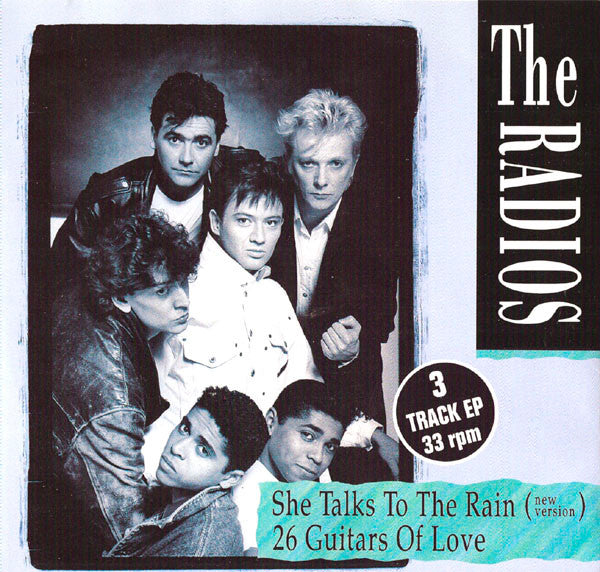 The Radios : She Talks To The Rain (New Version) / 26 Guitars Of Love (7", EP)