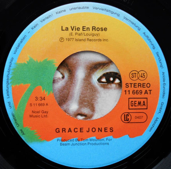 Grace Jones : La Vie En Rose / I Need A Man (7", Single)