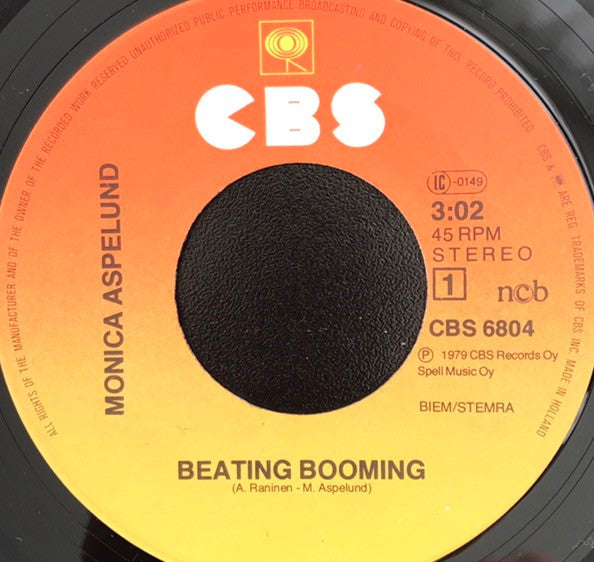 Monica Aspelund : Beating Booming (7", Single)