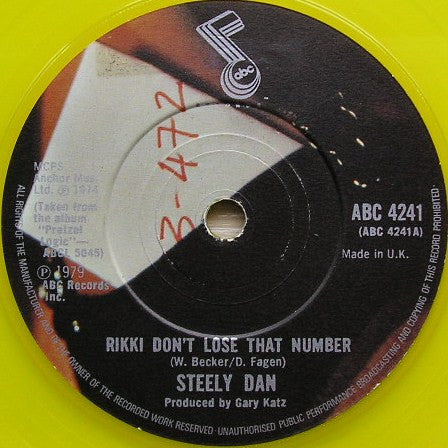 Steely Dan : Rikki Don't Lose That Number (7", Single, RE, Yel)