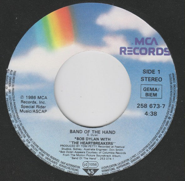 Bob Dylan With The Heartbreakers* : Band Of The Hand (7", Single)