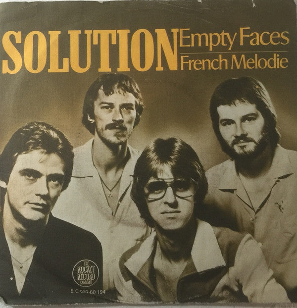 Solution (4) : Empty Faces (7", Single)