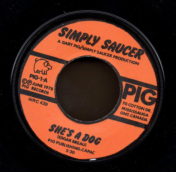 Simply Saucer : She's A Dog (7", Single)