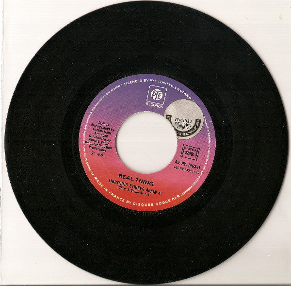 The Real Thing : Lightning Strikes Again / Dance With Me (7", Single)