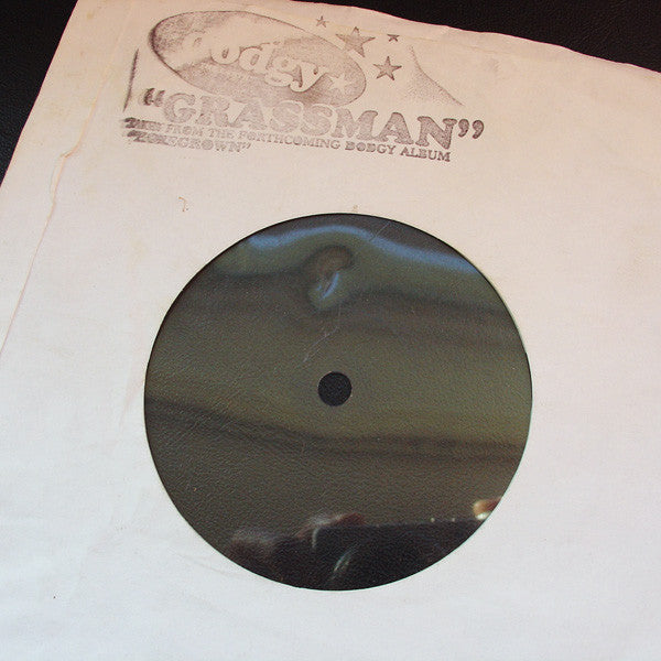 Dodgy : Grassman (7", S/Sided, Fle)