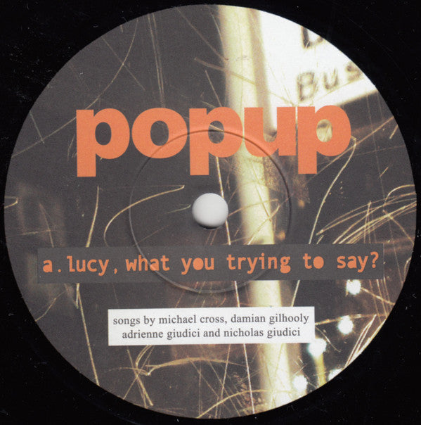 Popup : Lucy, What You Trying To Say? (7", Single)