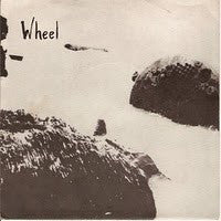 Wheel (4) : Lessons Of Tragedy (7", Ltd, Num, Pea)