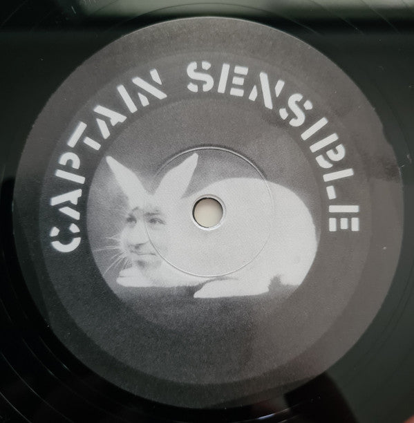 Captain Sensible : This Is Your Captain Speaking (12", Single, RE)