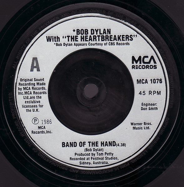 Bob Dylan With Tom Petty And The Heartbreakers : Band Of The Hand (7", Single, Sil)