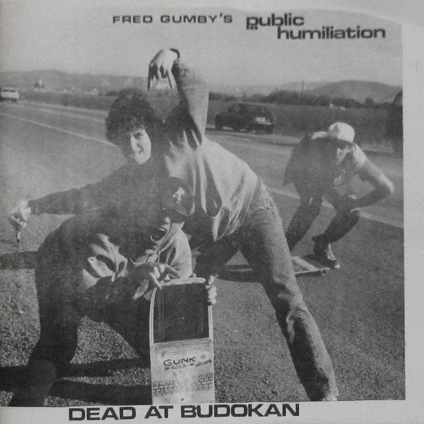 Public Humiliation : Dead At Budokan (7", Gol)