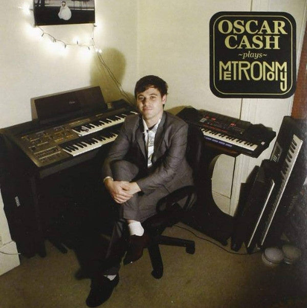 Oscar Cash : Oscar Cash Plays Metronomy (7", RSD, Single, Ltd)