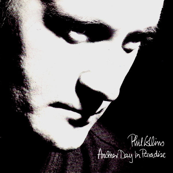 Phil Collins : Another Day In Paradise (7", Single, Sol)