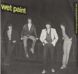 Wet Paint (11) : She Hangs Around (7")