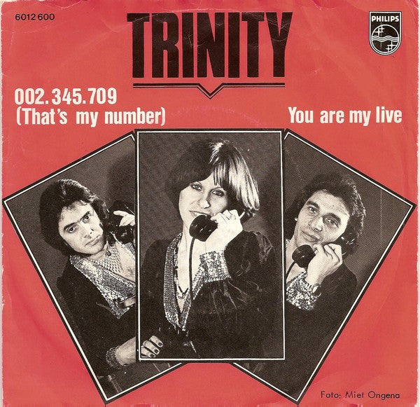 Trinity (14) : 002.345.709 (That's My Number) (7", Single)