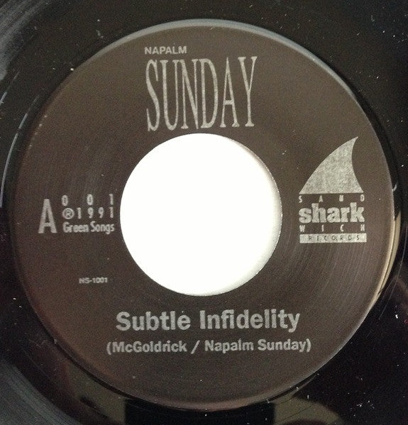 Napalm Sunday : Subtle Infidelity / She Believes (7")