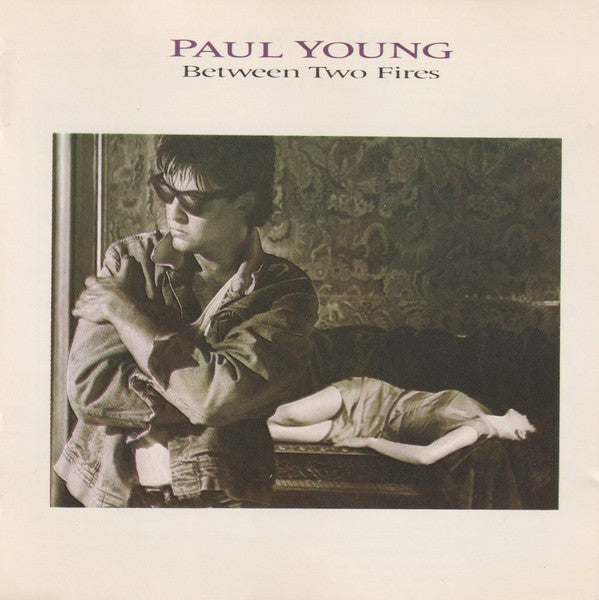 Paul Young : Between Two Fires (CD, Album)