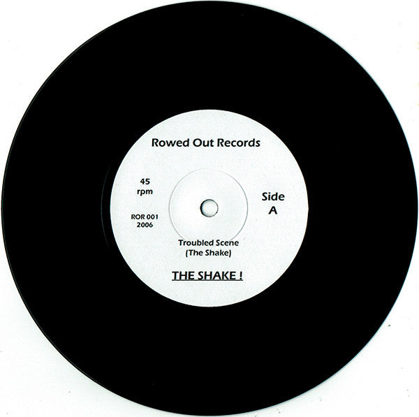The Shake! : Troubled Scene / Into The Sun (7", Single, Ltd, Num)