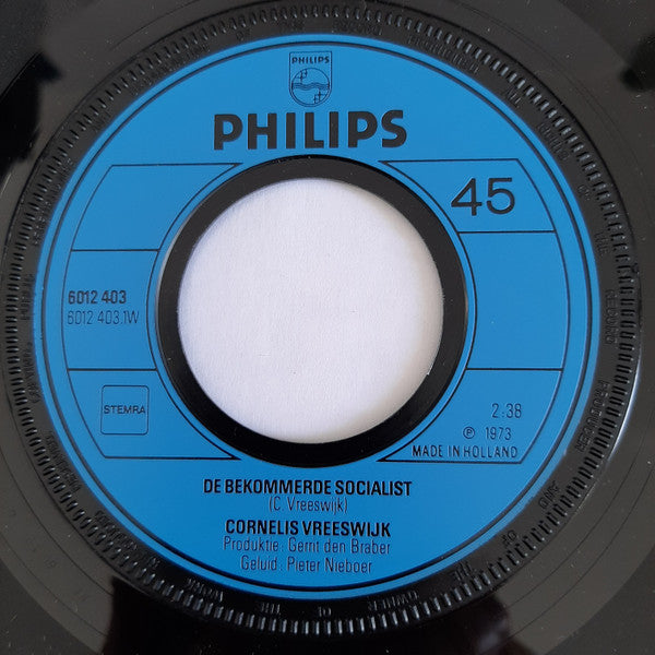 Cornelis Vreeswijk : De Bekommerde Socialist / Damrak Blues (7")