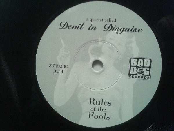 Devil In Disguise : Rules Of The Fools (7", EP)