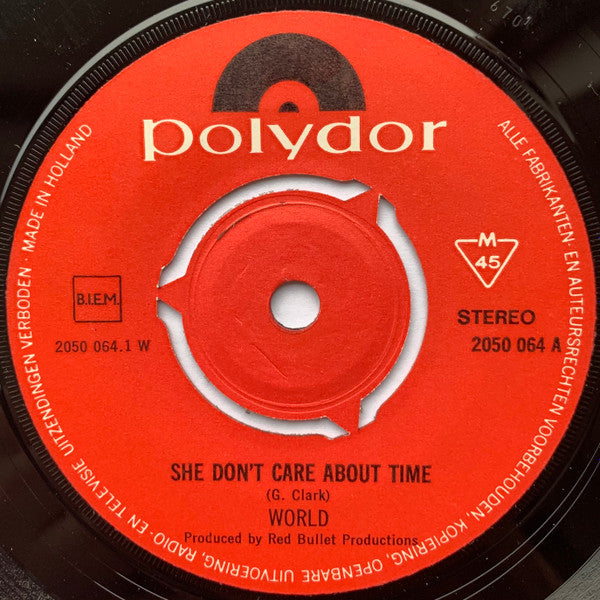 World (10) : She Don't Care About Time (7", Single)