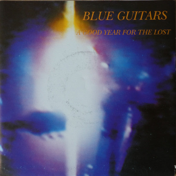 Blue Guitars : A Good Year For The Lost (7", Single)