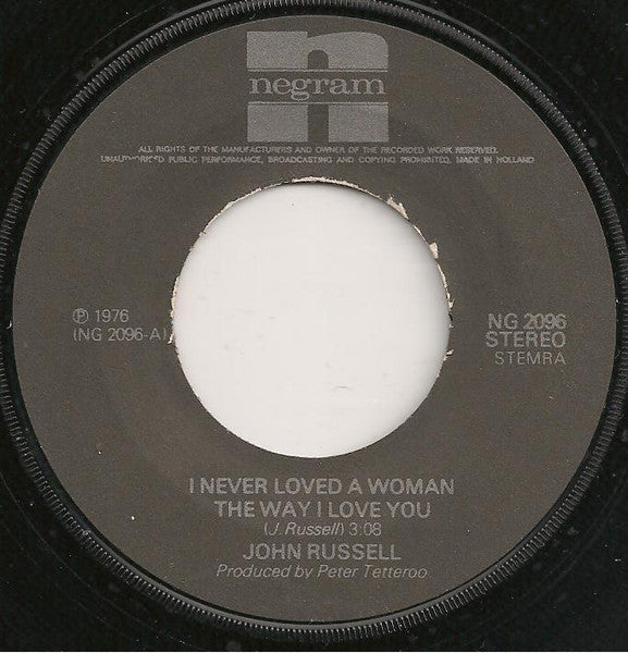 John Russell* : I Never Loved A Woman The Way I Love You (7", Single, Gre)